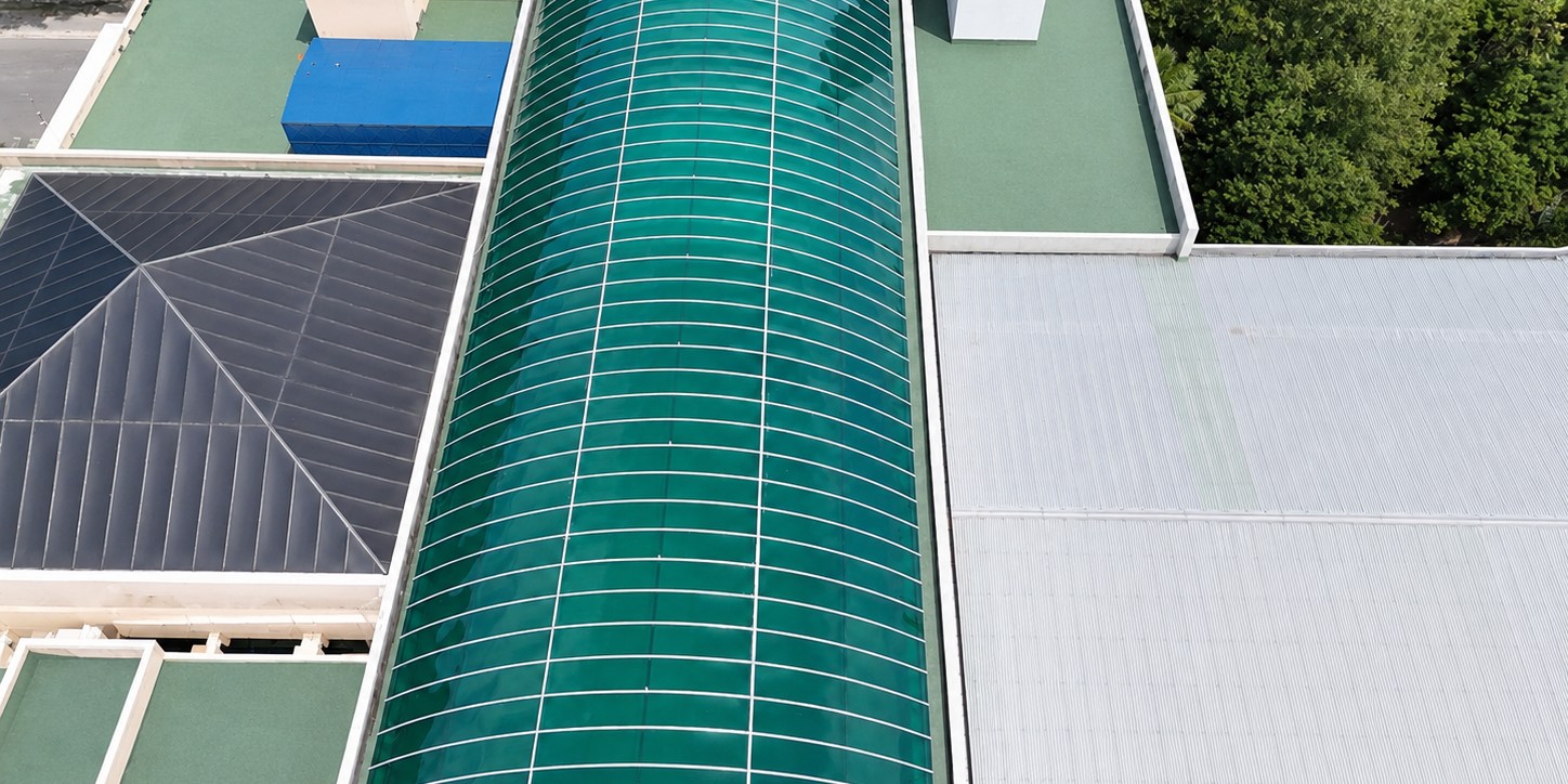 Aerial view of a curved SolarFlat polycarbonate barrel-vault roof